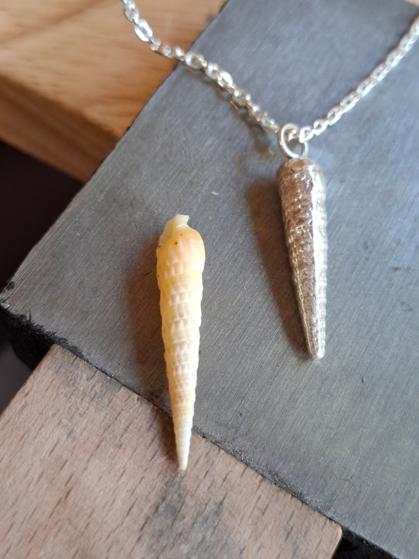 Silver auger shell pendant necklace