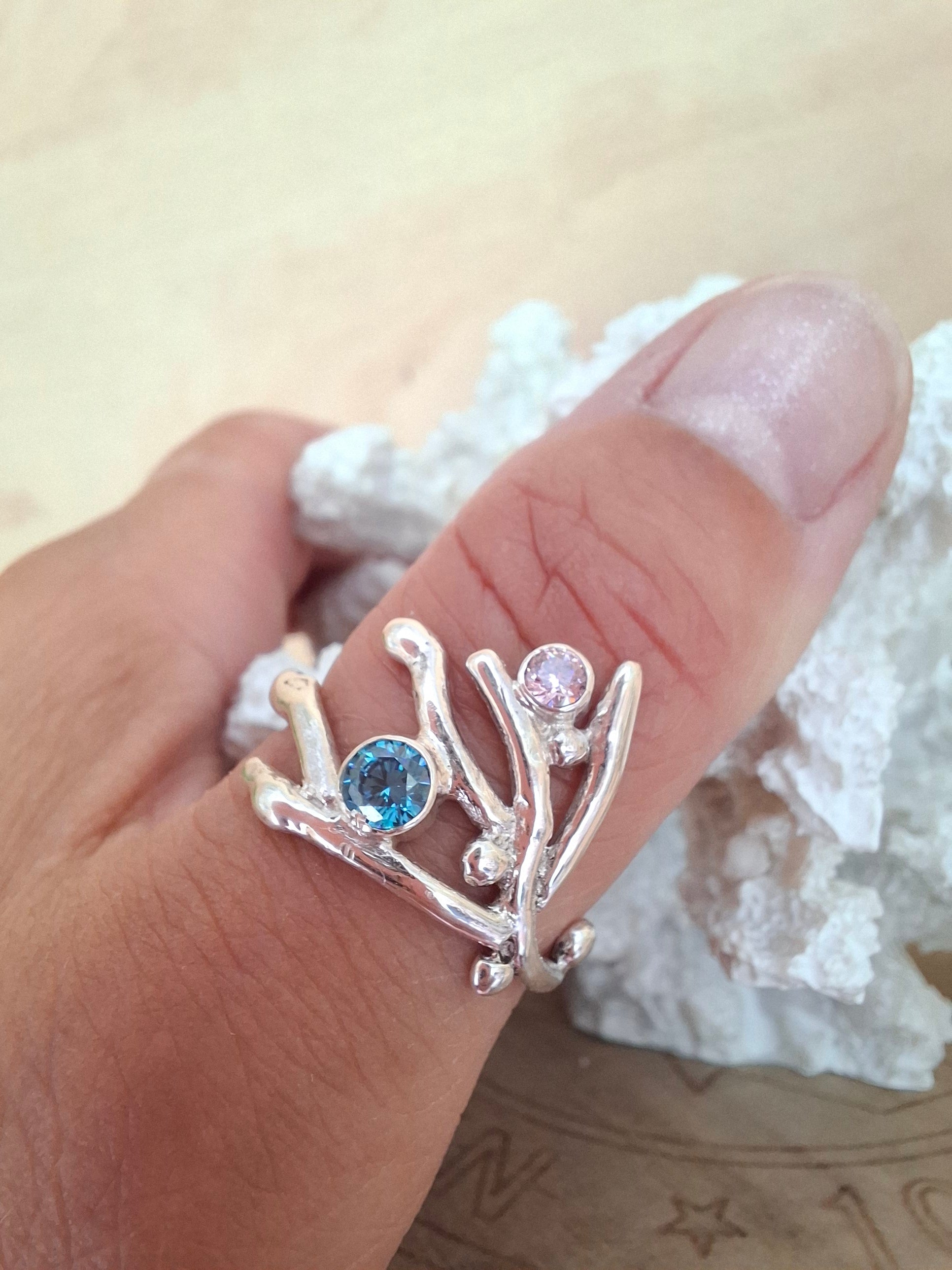 Coral inspired sterling silver ring with aquamarine and rose pink cubic zirconia stones.