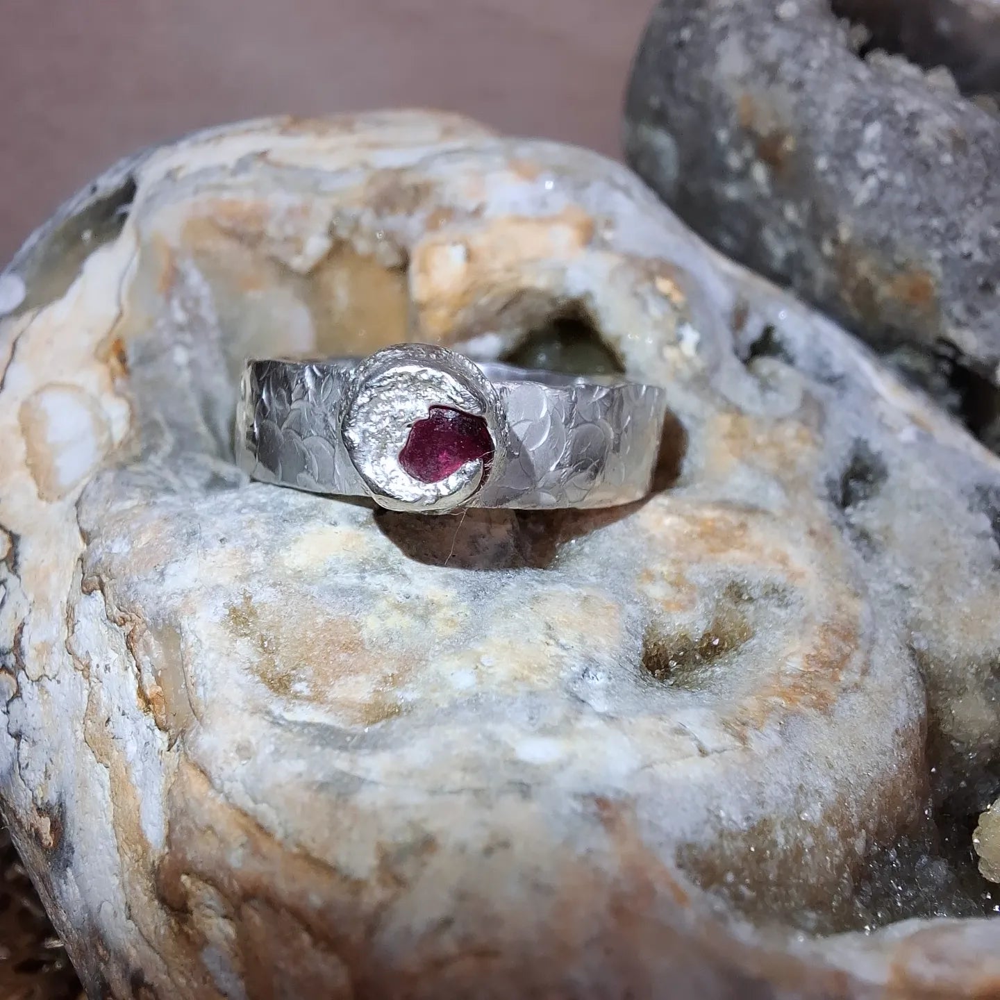 Ruby & silver hammered ring